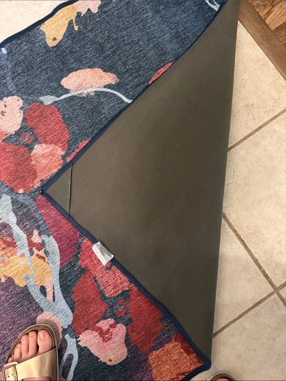 Ruggable flat woven watercolor floral rug in Navy and Coral. Cover only